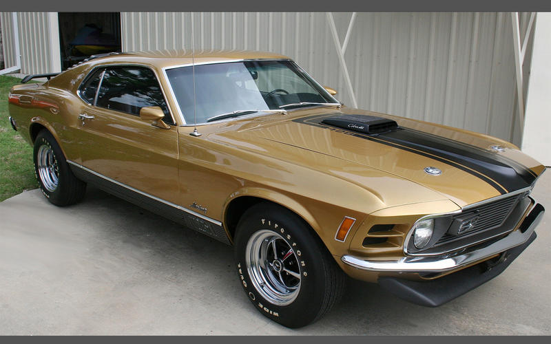 The classic mustard yellow Mustang Mach super car